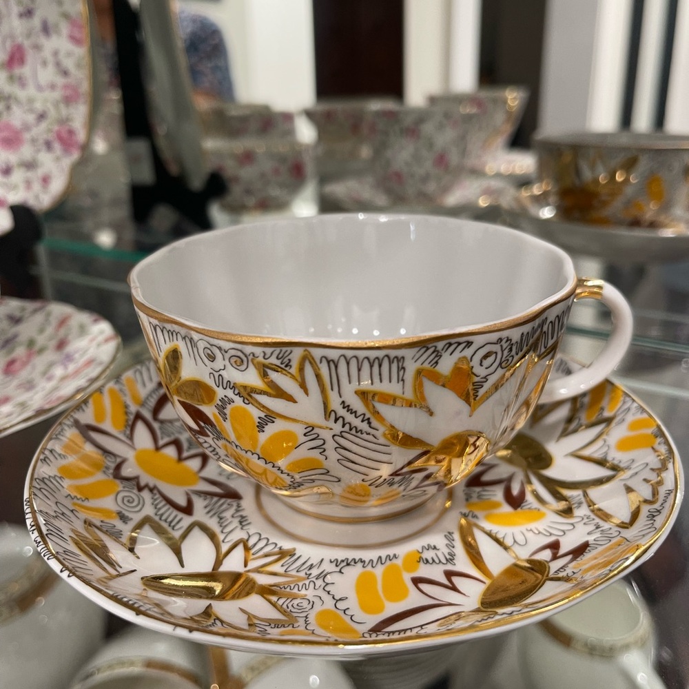 SOLD 


Elegant Gold and Yellow Teacup and Saucer Set